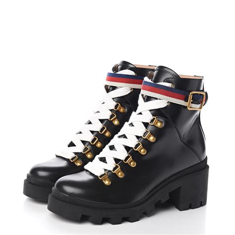 black lace up Gucci boots